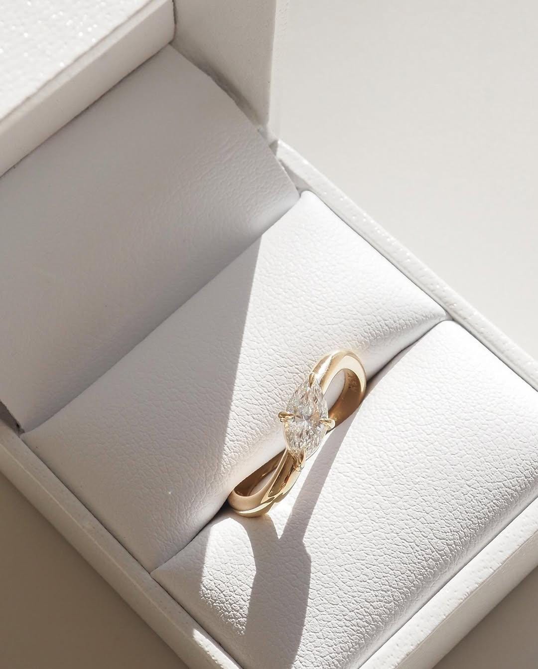 Discover our fine diamond engagement ring, currently available as part of our engagement ring collection with a 1 carat marquise stone. - AuraJewelsCA