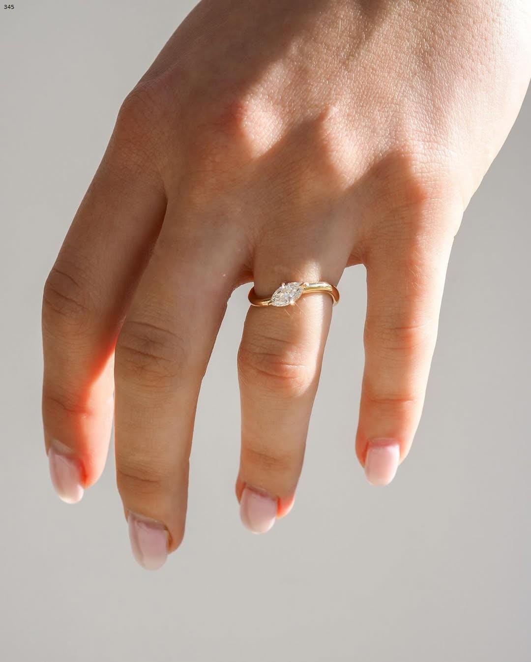 Discover our fine diamond engagement ring, currently available as part of our engagement ring collection with a 1 carat marquise stone. - AuraJewelsCA
